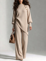 Two-piece Set Featuring A Comfortable Ribbed Knit Top With An Asymmetrical Hem And Matching Pants
