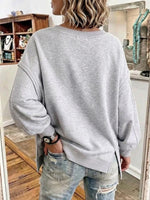 V-neck Drop-shoulder Sweatshirt With A Front Twist Detail
