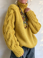 Relaxed Chunky Cable Knit Turtleneck Sweater